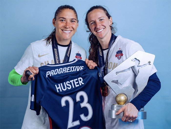 Aubrey Kingsbury (at left, pictured here with Andi Sullivan) is an American professional soccer player who plays as a goalkeeper for the Washington Spirit in the National Women's Soccer League. Aubrey is 30 years old and hails from Cincinnati, OH. (Image courtesy of Javi Dussaq, Washington Spirit)