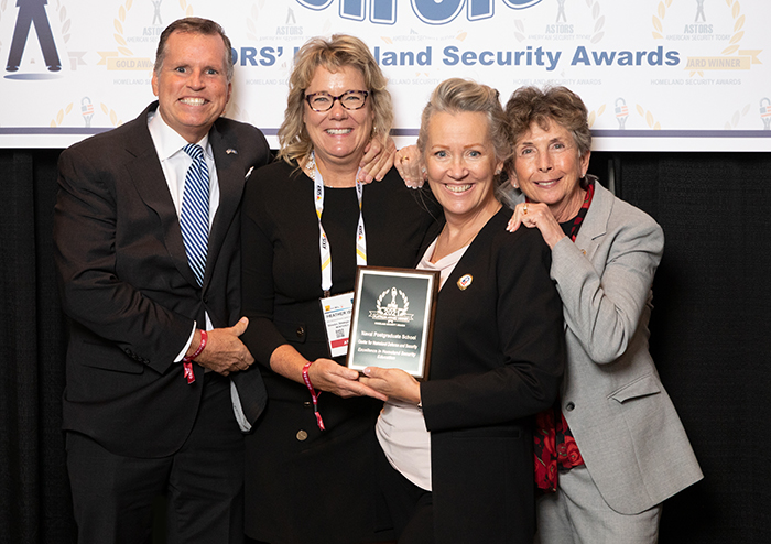 Heather Hollingsworth Issvoran (second from left), the Director of Strategic Communications for the Center for Homeland Defense and Security at Naval Postgraduate School, accepts the 2021 ‘ASTORS’ Platinum Award for Excellence in Homeland Security at ISC East in New York City.