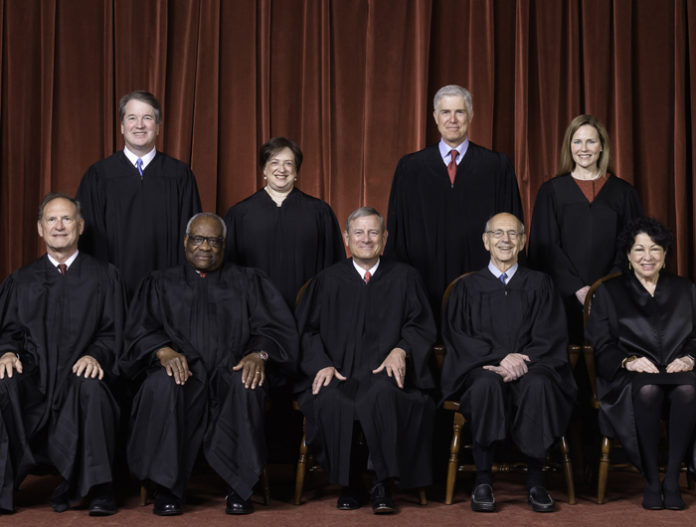 The Supreme Court as composed October 27, 2020 to present. Front row, left to right: Associate Justice Samuel A. Alito, Jr., Associate Justice Clarence Thomas, Chief Justice John G. Roberts, Jr., Associate Justice Stephen G. Breyer, and Associate Justice Sonia Sotomayor. Back row, left to right: Associate Justice Brett M. Kavanaugh, Associate Justice Elena Kagan, Associate Justice Neil M. Gorsuch, and Associate Justice Amy Coney Barrett. (Courtesy of The Supreme Court of the United States by Fred Schilling)