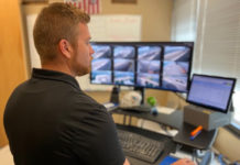 The Canaveral Port Authority (CPA) is slated to receive $1,357,020 in federal funding for two projects to help bolster safety and security at Port Canaveral. Shown here, Cory Dibble, the Canaveral Port Authority Director of Public Safety & Security monitors Port security cameras (Courtesy of CPA)