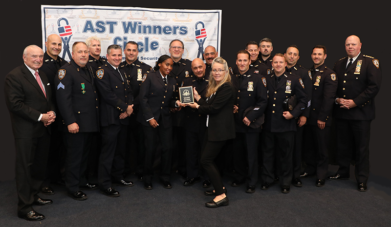 Deputy Inspector Lashonda Dyce accepts a 2022 'ASTORS' Award on behalf of the NYPD TARU Unit for Excellence in Public Safety.