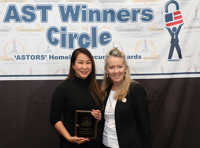 Program Manager for DHS S&T REDOPS Byung Hee Kim, accepts a 2022 Excellence Award at the 2022 'ASTORS' Awards Luncheon in New York City.