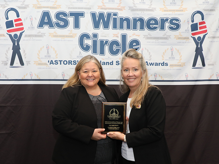 Kym Craven, Executive Director National Association of Women Law Enforcement Executives (NAWLEE), accepts the organizations 2022 Excellence in Public Safety & Community Resilience Award at the 2022 ‘ASTORS’ Awards Ceremony in NYC.