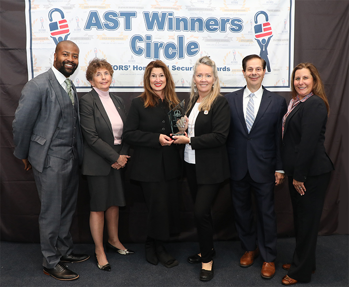 Team NEC National Security Systems (NSS), the 2022 Platinum ‘ASTORS’ Awards Program Sponsor, which includes Christopher Gillyard, Senior Account Manager; Dr. Kathleen Kiernan, President of NEC NSS; Kimberly Archer, Head of Operations, Frank Sangiorgi, Director; and Stephanie Yanta, Senior Account Manager; accept a much-coveted 2022 ‘ASTORS’ Leadership & Innovation Award at the 2022 ‘ASTORS’ Homeland Security Awards Ceremony.