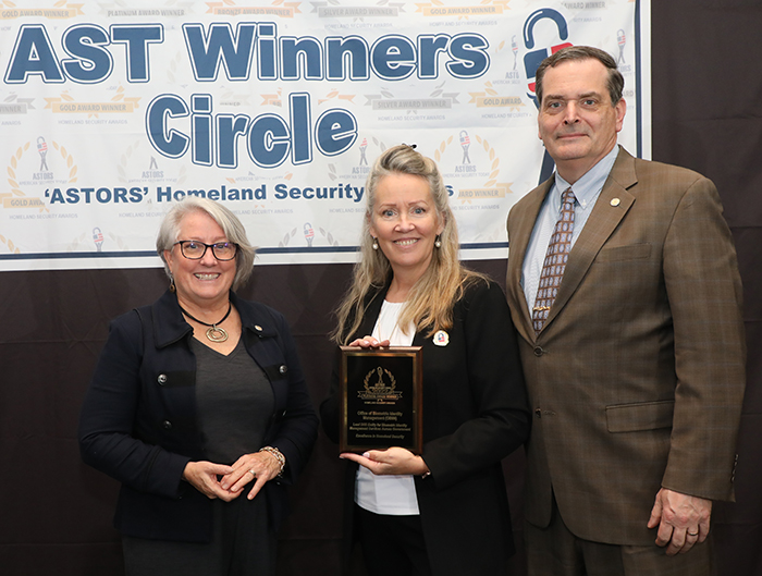 John Boyd, Assistant Director of the DHS Office of Biometric Identity Management (OBIM), and Chief of Staff Penelope Smith, accept OBIM’s 2022 Excellence in Homeland Security Award at the 2022 ‘ASTORS’ Homeland Security Awards Ceremony in New York City.