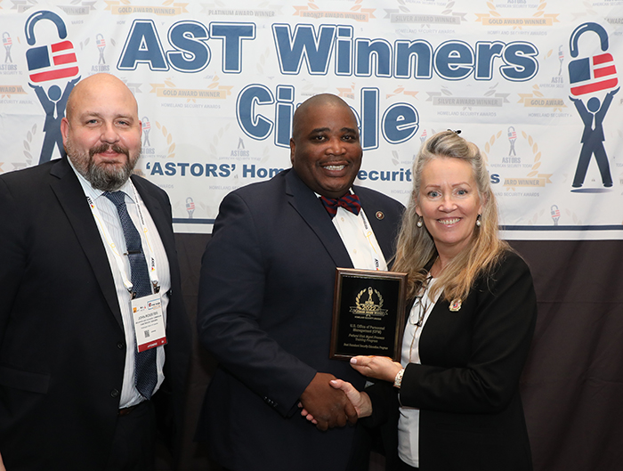 John Rossiter, Security Specialist at the US Securities and Exchange Commission (at left); and Kevin McCombs, Director of Security Services Division for the U.S. Office of Personnel Management accept their 2022 ‘ASTORS’ Award for the Federal Risk Mgmt Process Training Program at the 2022 ‘ASTORS’ Awards Ceremony.