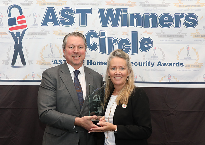 Michael Struttman, CEO and president of SIMS Software, the most trusted supplier of industrial security information management software to the government and defense industries, accepts the coveted 2022 'ASTORS' Leadership & Innovation Award at the 2022 Awards Ceremony.