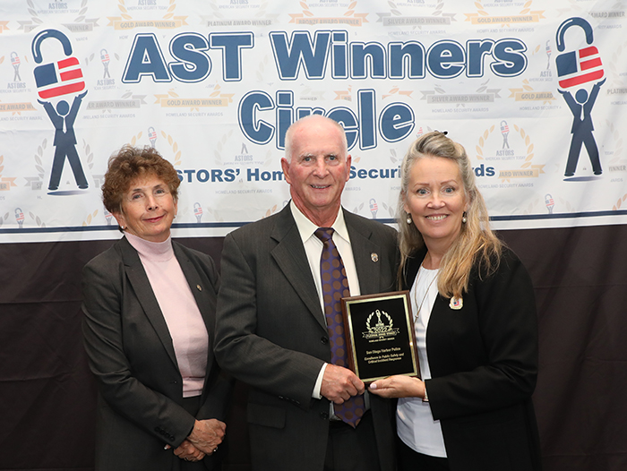 Jeff Wohler, Chief Executive Officer of the San Diego Harbor Police Foundation, shown here with Dr. Kathleen Kiernan, President of NEC National Security Systems (NSS), the 2022 ‘ASTORS’ Awards Program Platinum Sponsor, accepts the SDHP Excellence in Public Safety and Critical Incident Response Award at the 2022 ‘ASTORS’ Awards Ceremony.