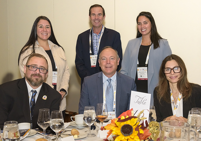 Liberty Defense CEO Bill Frain (center front), and Tom McIntyre, Director of Sales (center back), join members of CBP OFO to enjoy the 2022 'ASTORS' Awards Ceremony and Exclusive Sold-Out Luncheon in NYC, during ISC East.