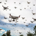 Dozens,Of,Drones,Swarm,In,The,Cloudy,Sky.