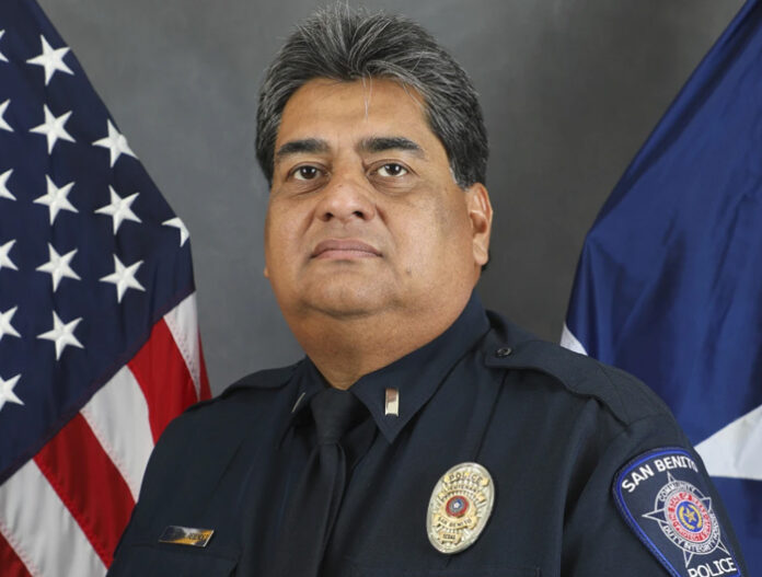 Lt. Milton Resendez, a 27-year veteran of the San Benito Police Department was pronounced dead at a hospital after a bullet went through the door of his patrol car and struck him in the abdomen just below his body armor.