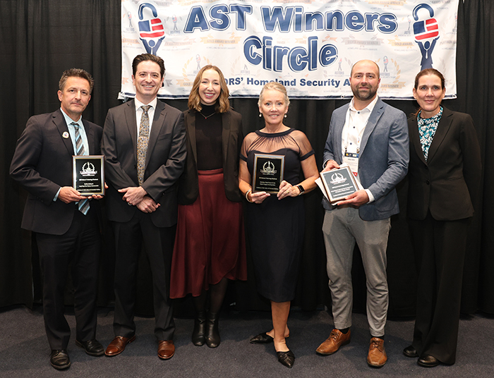 Norman Speicher, Program Manager; along with Principal Investigator Max Romanik; Project Manager Sophie Bennett-Romanik; Jared Oren, Director, Test & Evaluation Division (GS-15); and Deb Jordan, Program Analyst; accept Three 2023 'ASTORS' Awards for Excellence in Public Safety and Community Resilience in the 2023 Homeland Security Awards in NYC.