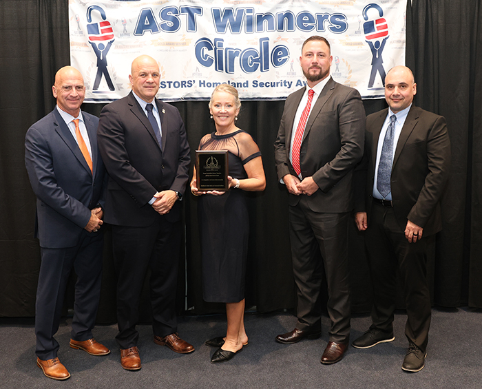 Joseph Arata, HSI Deputy Assistant Director; Harley Ray Shuler, Acting Deputy Assistant Director for Homeland Security Investigations at the Cyber Crimes Center; Brian Korzak, HSI Unit Chief, Cyber Crimes Unit, and James Brown, HERO Computer Forensic Analyst, accepts a 2023 ‘ASTORS’ Excellence for U.S. Immigrations & Customs Enforcement (ICE) on behalf of the HERO Child Rescue Corps Program.