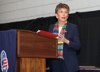 Dr. Kathleen Kiernan, a 29-year veteran of Federal Law Enforcement and President of NEC National Security Systems (shown here speaking to attendees at the 2023 'ASTORS' Homeland Security and Government Excellence Awards Ceremony), created the nonprofit PWPORG to educate, engage, and empower families and kids on issues of preparedness and resiliency to create a safer world, free of active threats and human traffickers.