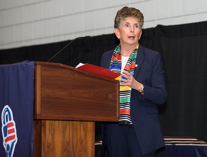 Dr. Kathleen Kiernan, a 29-year veteran of Federal Law Enforcement and President of NEC National Security Systems (shown here speaking to attendees at the 2023 'ASTORS' Homeland Security and Government Excellence Awards Ceremony), created the nonprofit PWPORG to educate, engage, and empower families and kids on issues of preparedness and resiliency to create a safer world, free of active threats and human traffickers.