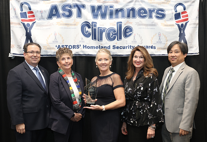 TEAM NEC National Security Systems (NSS) Neal Byrd, Vice President Federal Sales (left to right); Dr. Kathleen Kiernan, President; Kimberly Archer, Head of Operations; and Austin Park, Director of Technology accept the much coveted NEC NSS 2023 ‘ASTORS’ Leadership & Innovation Award, from AST’s Managing Director Tammy Waitt (at center).
