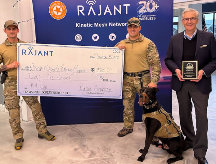 Rajant CEO Robert Schena, presents a check to the Friends of Chester County Emergency Response K9 Unit, while holding the company’s 2023 ‘ASTORS’ Homeland Security Award for “Best Wireless Video Surveillance Network Solution.